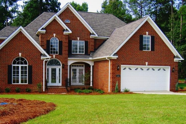 Двухэтажные дома из кирпича - проекты и фото