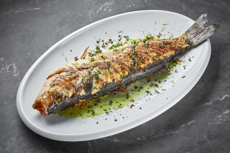 Фаршированный сибас в духовке