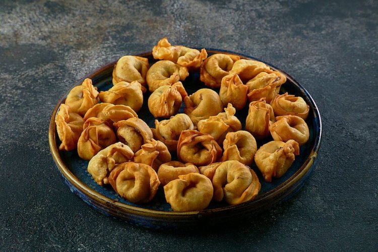 Жареная чучвара с картошкой