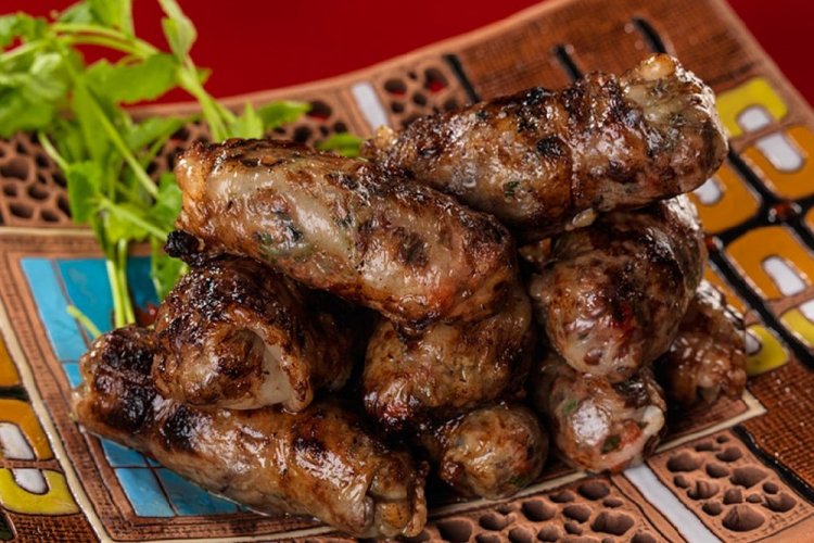 Пикантный шашлык из говяжьей печени в жировой сетке