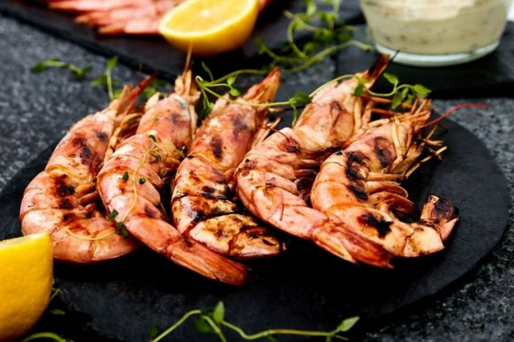 Лангустины в ароматном соусе на гриле