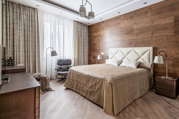 Ламинат на стене в спальне - фото