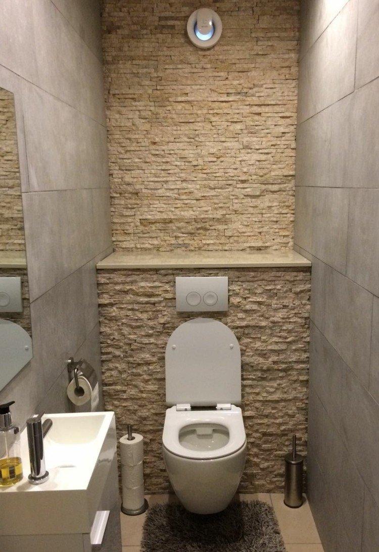 Декоративный камень - отделка стен в туалете