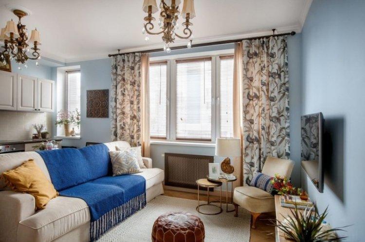 Синий цвет в интерьере гостиной - фото